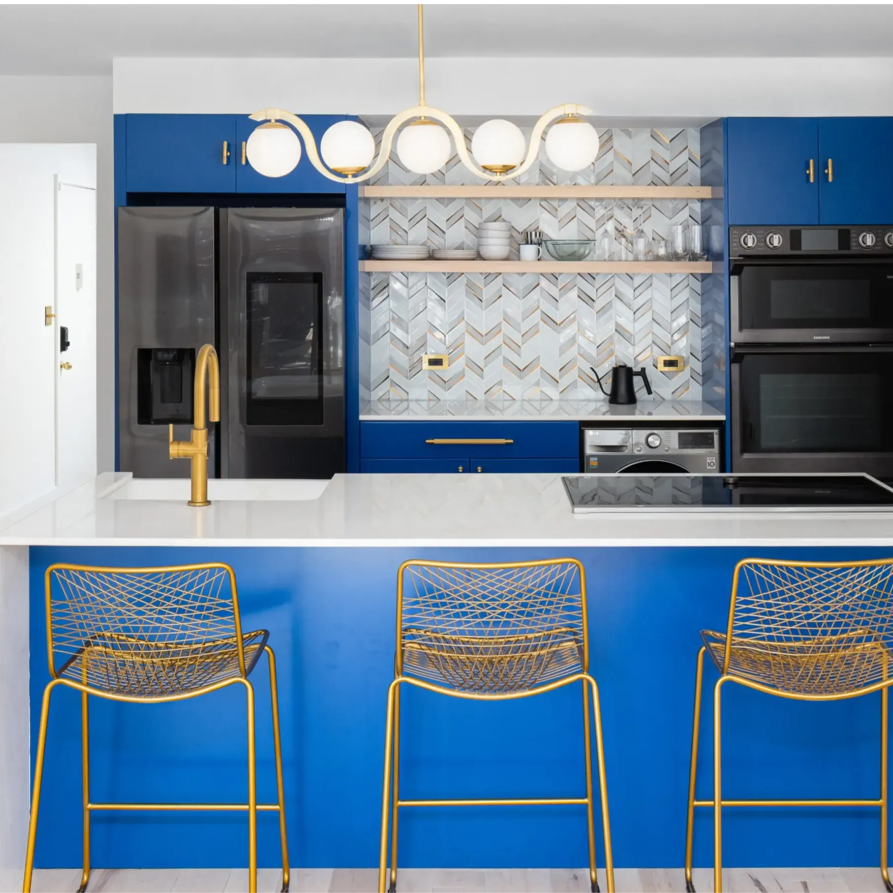 Renovated Brooklyn kitchen with custom cabinetry, stone countertops, and natural light