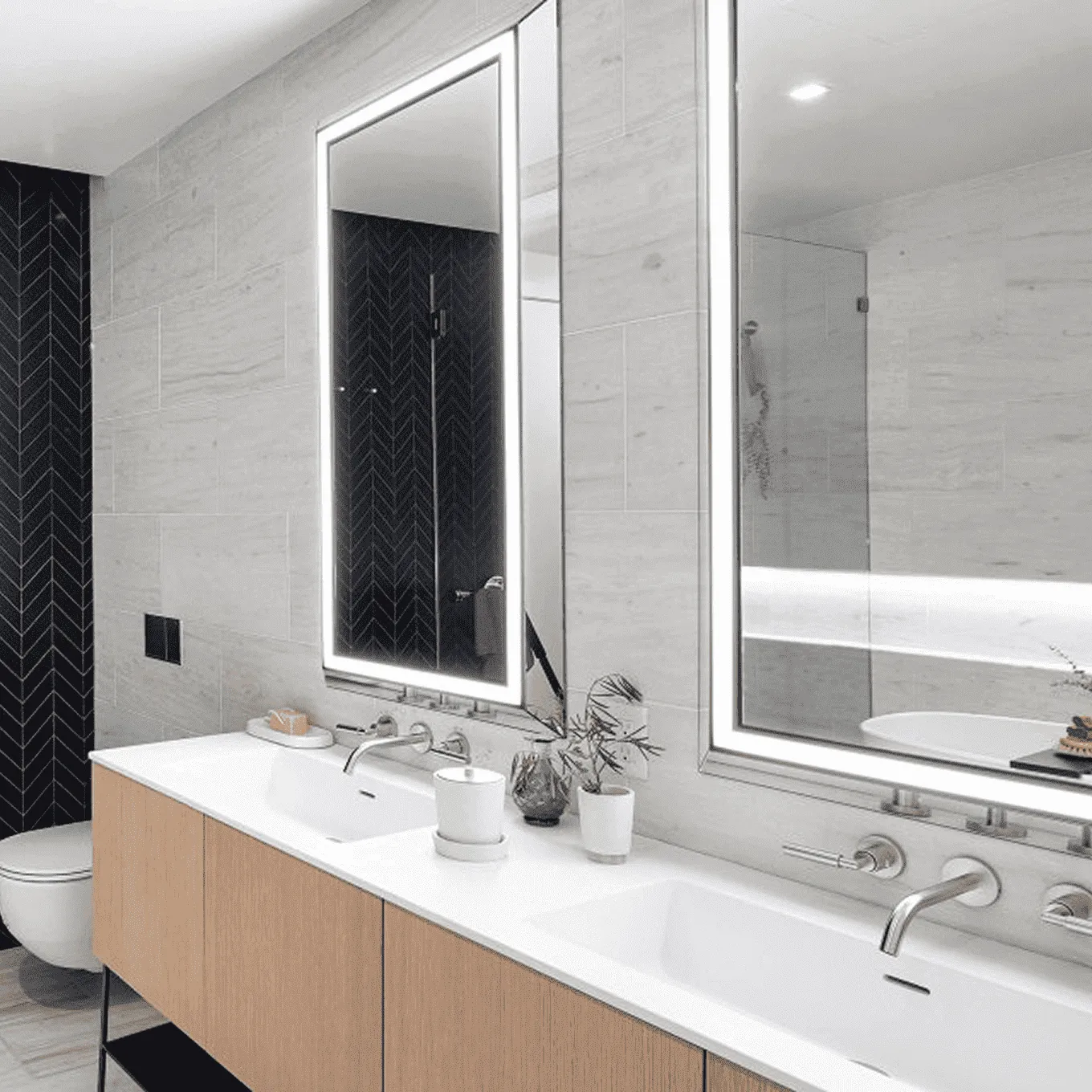 Contemporary bathroom renovation in Chelsea, NYC featuring double vanity, LED mirror, and walk-in shower.
