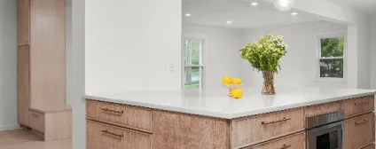 Built-in entry storage and bench in Rye single family home with custom millwork and storage solutions