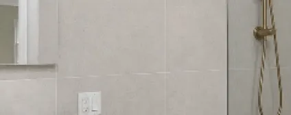 Azure light blue glossy wall tile in Rye single family home with custom millwork and storage solutions