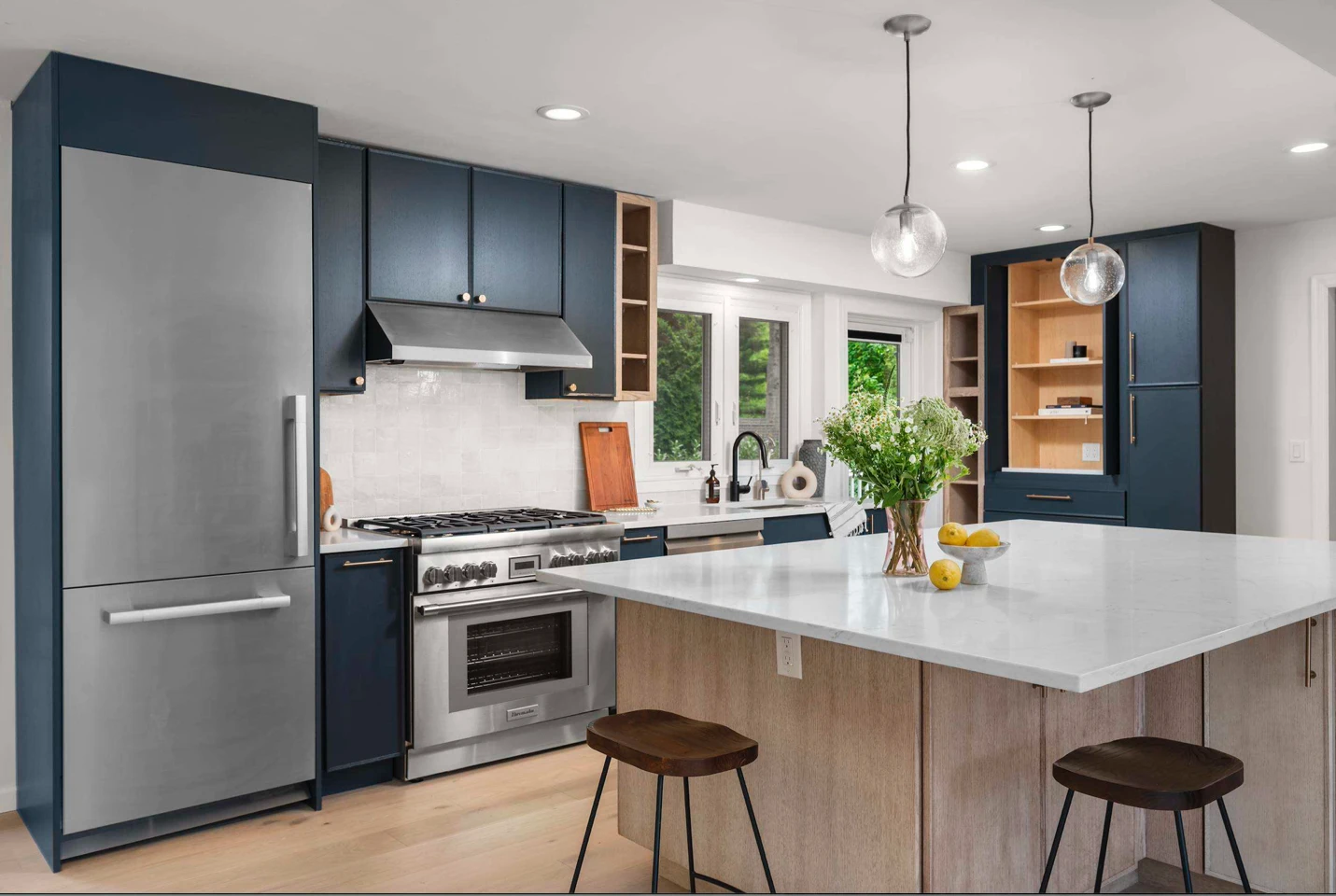 New flooring and cohesive finishes installed throughout main living areas of renovated Rye single family home