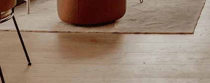 Light-toned engineered wood floors installed throughout the Axis Brickell condo for a cohesive design.