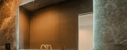 Large-format porcelain slabs providing seamless modern finishes throughout Miami condo renovation