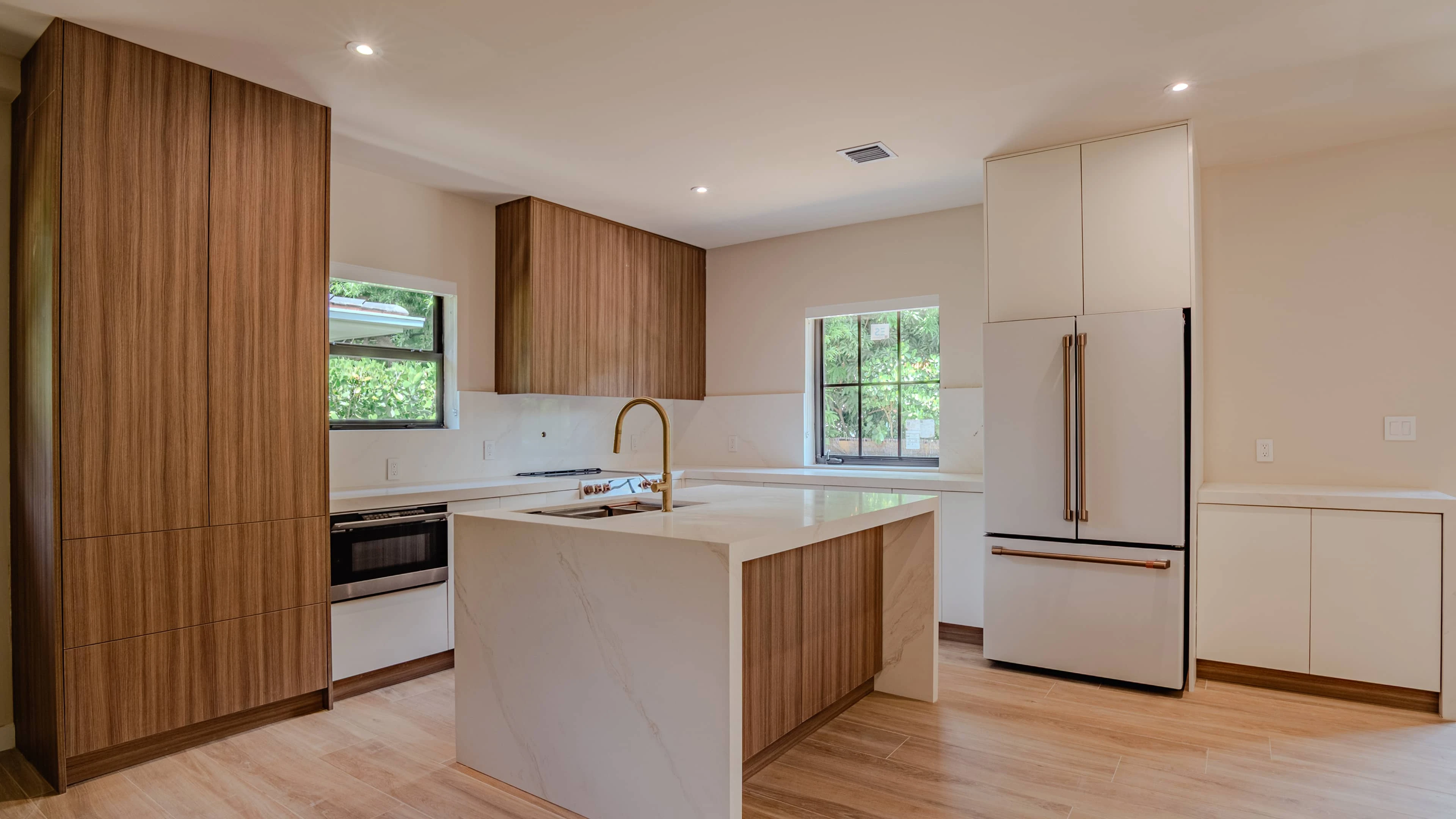 Modern open-concept living and dining area in a renovated Axis