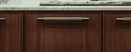 Polished chrome bathroom fixtures with 1930s-inspired ornamental detailing combining classic style with modern performance