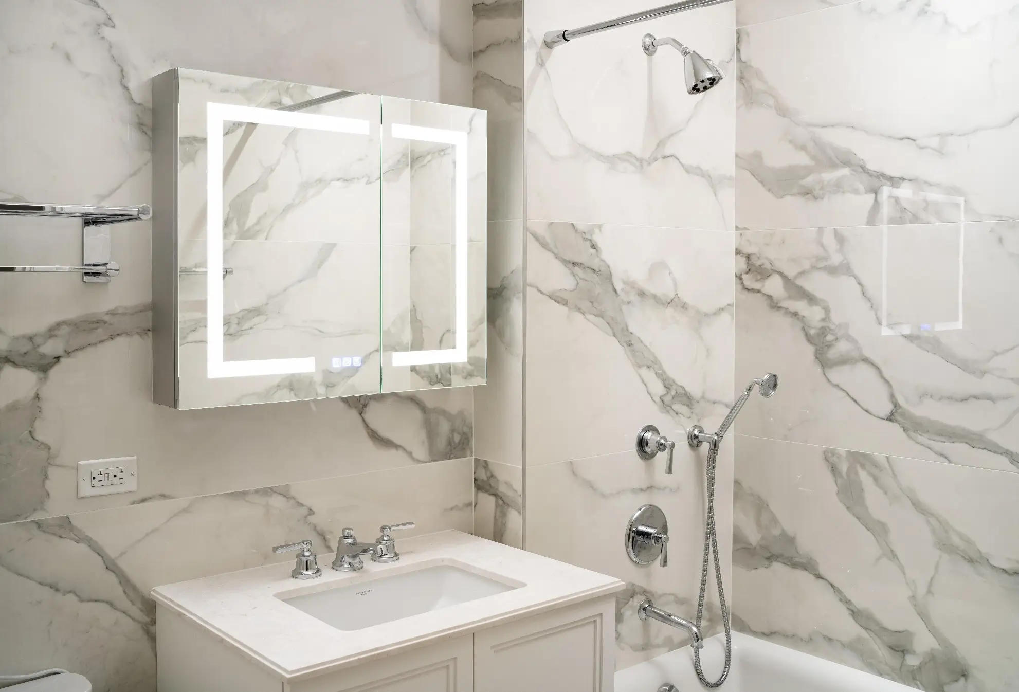 Wynwood bathrooms renovation guest bathroom with preserved vanity and mirror