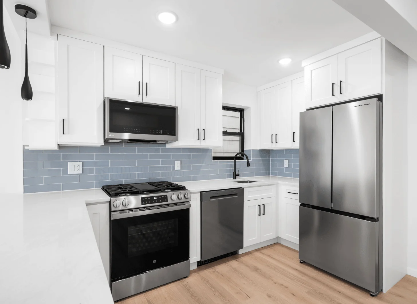 Renovated Union City interior with custom shelving and integrated lighting