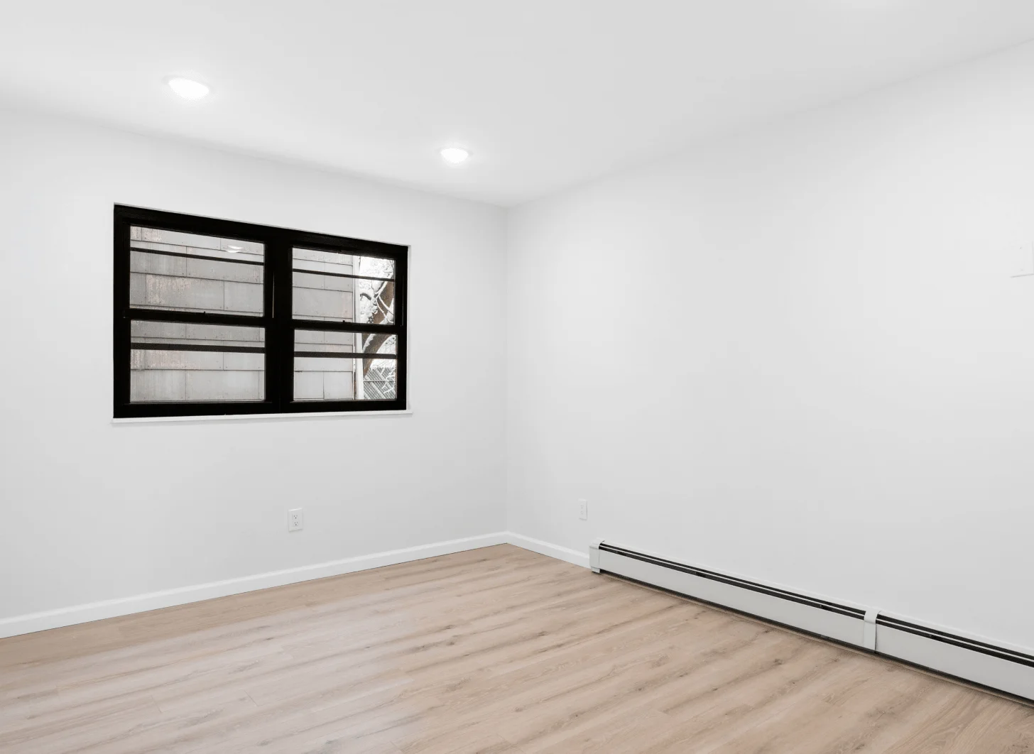 Union City room two after renovation with modern fixtures and refreshed finishes