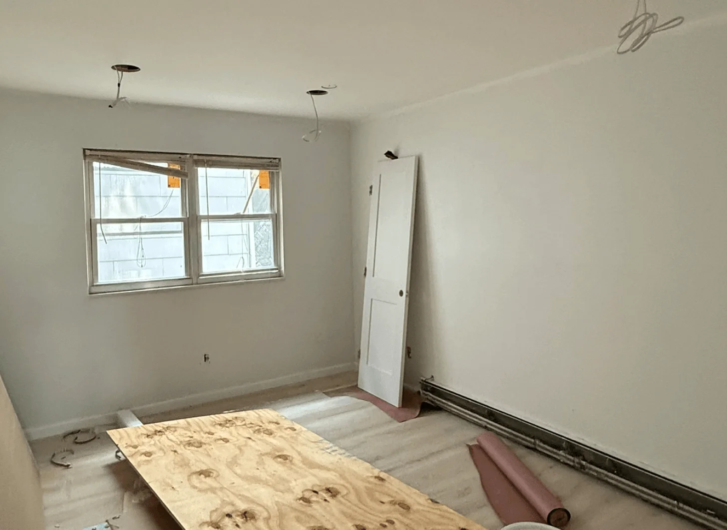 Union City room two before renovation with outdated layout and fixtures