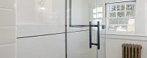 Custom shower door installed in West Orange bathroom renovation