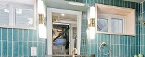 Nickel-plated wall mirror with original Vienna mirror from the 1970s used in West Orange bathroom renovation