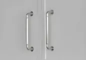 Polished chrome cabinet hardware pulls on white cabinetry