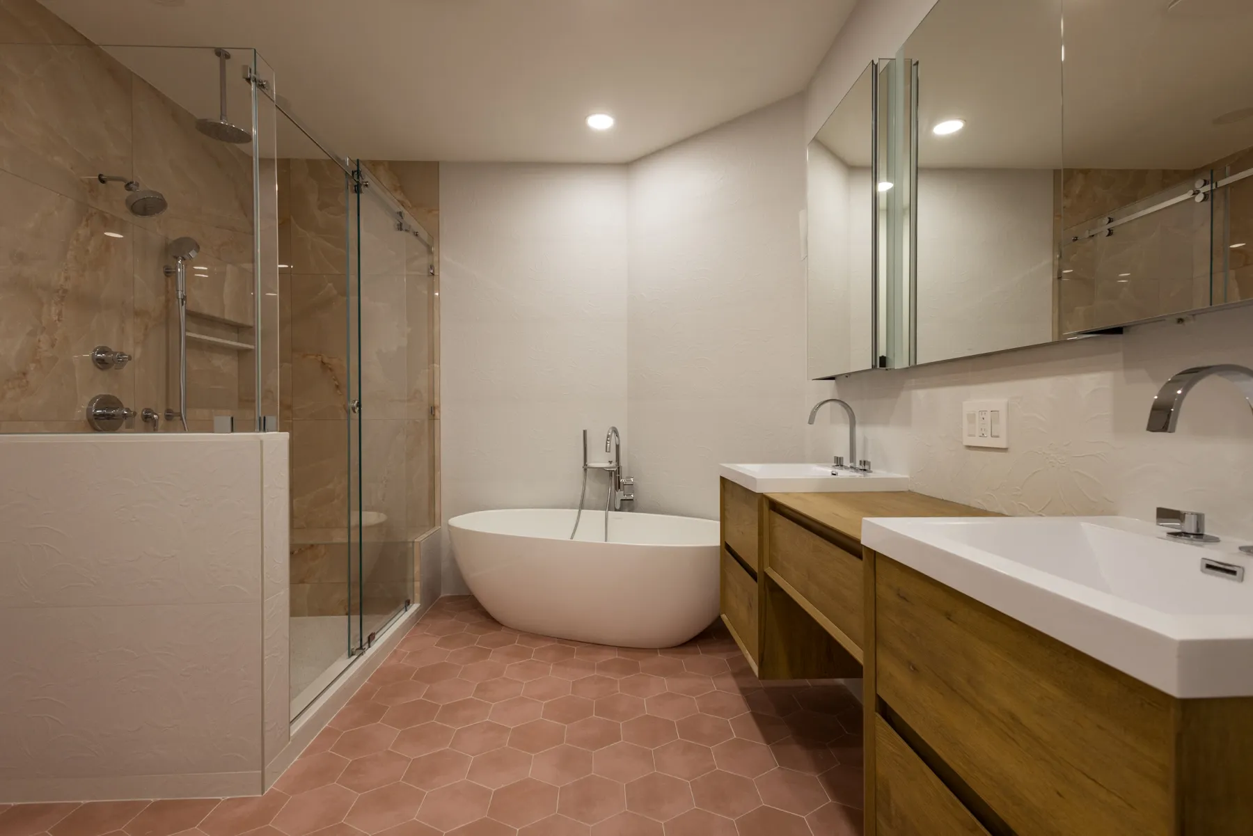 After renovation of Rye Brook powder room with floral wallpaper, updated vanity, and modern fixtures