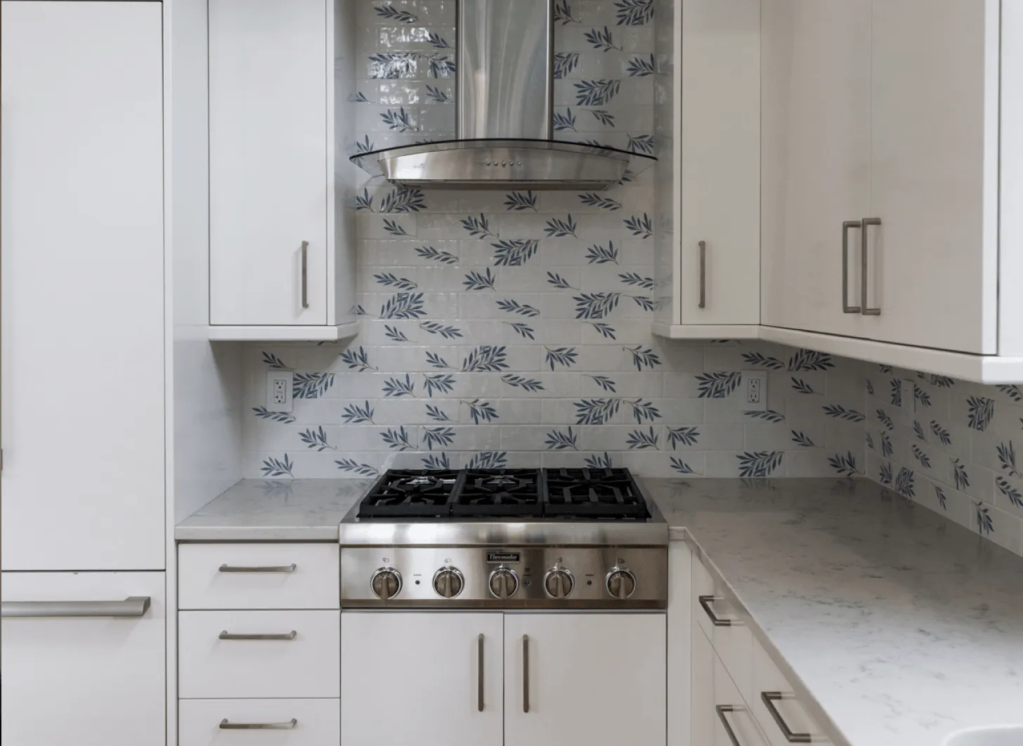 After renovation of Rye Brook kitchen with floral subway tile backsplash and updated finishes