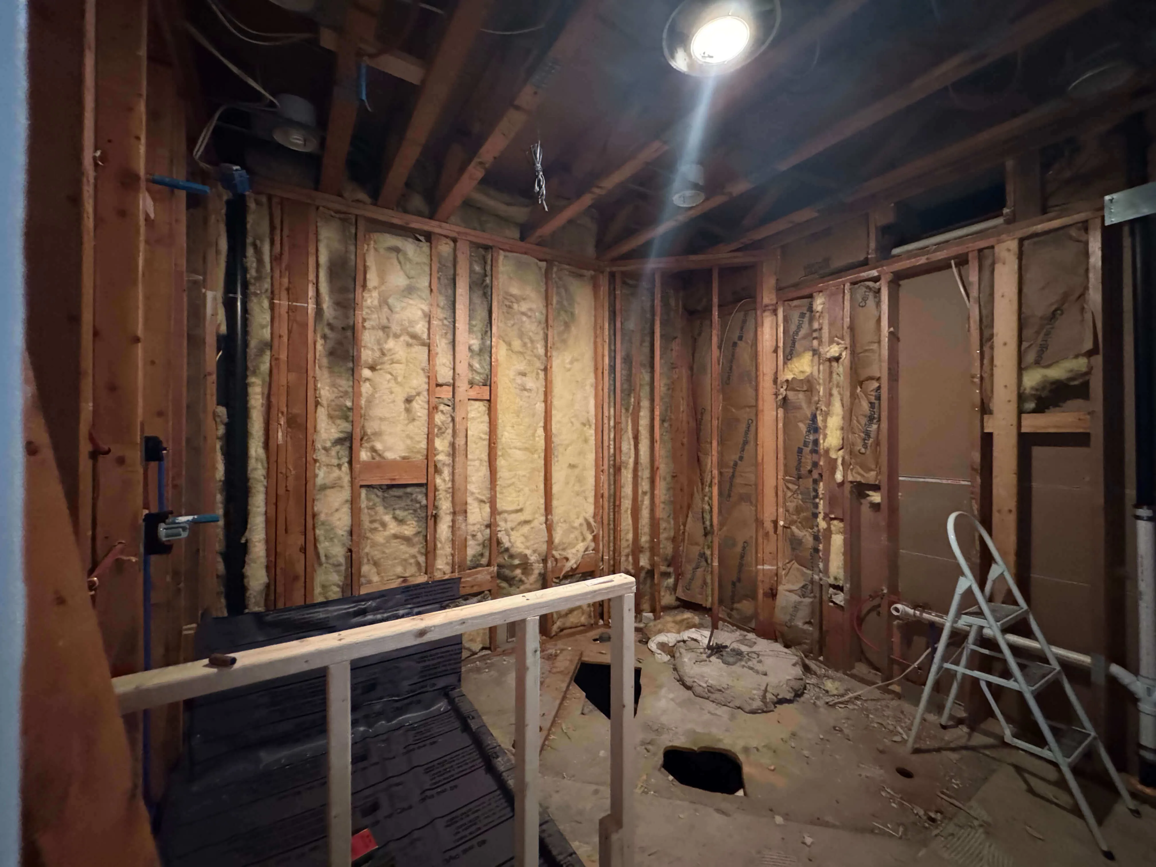 Before renovation of Rye Brook home interior showing original flooring and wall finishes
