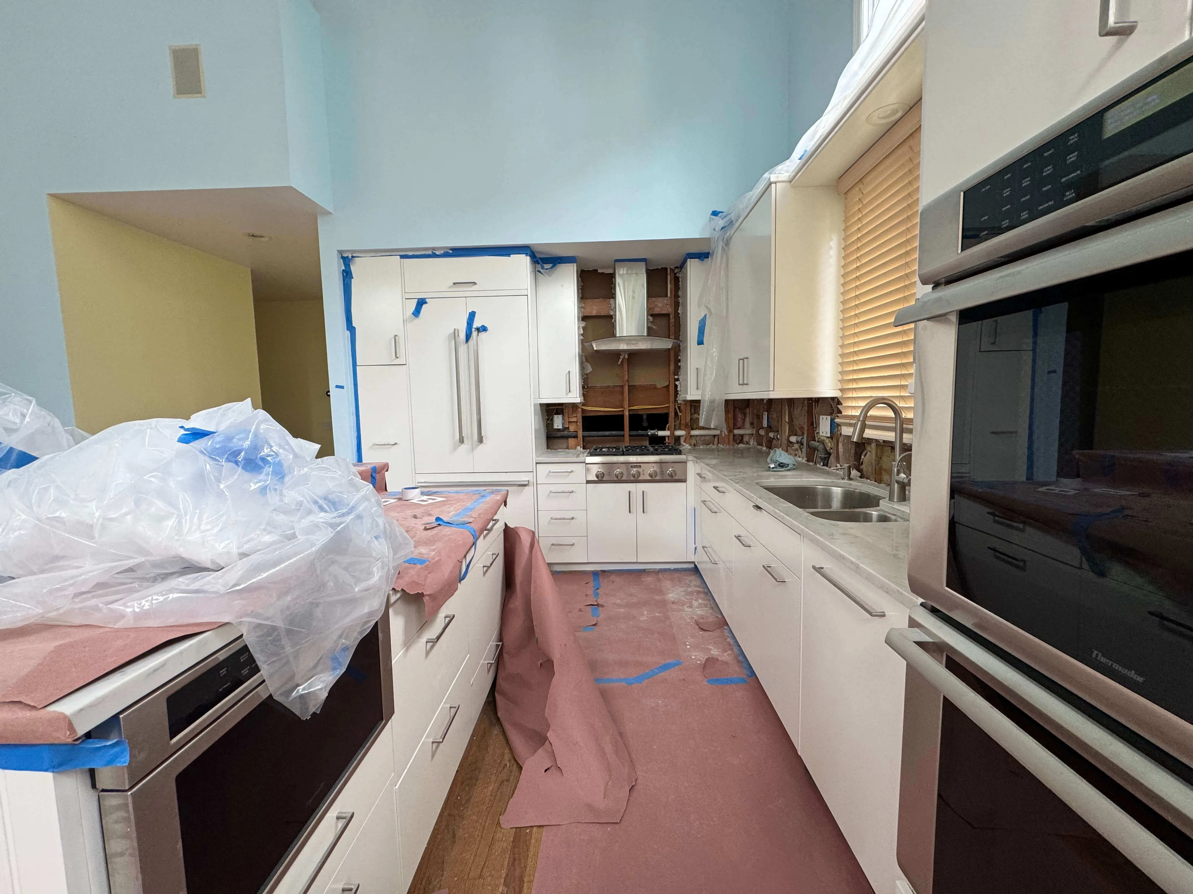 Before renovation of Rye Brook kitchen showing original backsplash and cabinetry