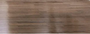 Hardwood floors sanded and stained with a custom-selected finish throughout the Rye Brook home