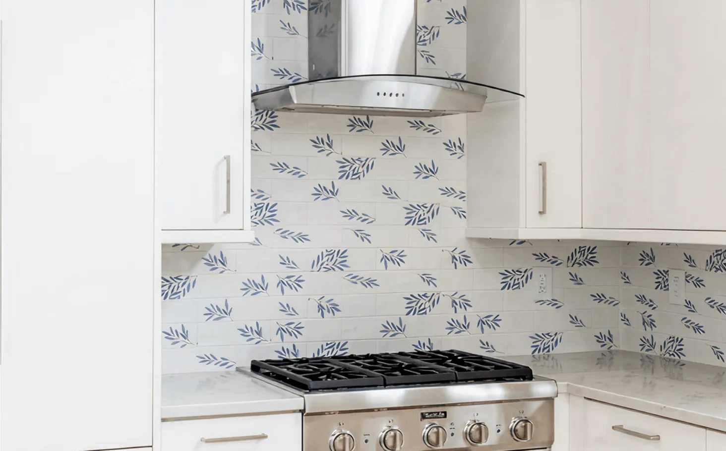 Renovated Rye Brook kitchen featuring floral subway tile backsplash with handcrafted charm