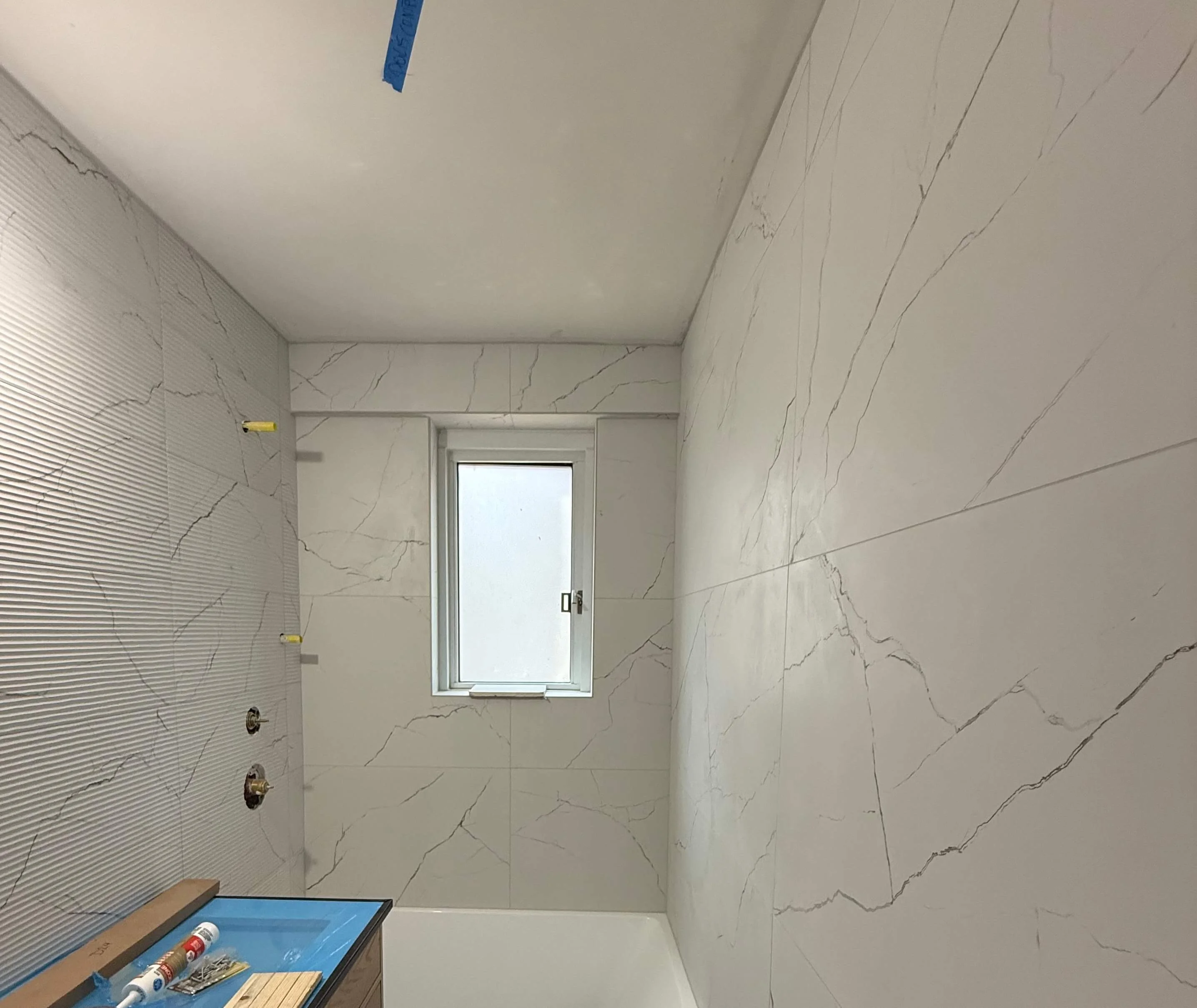 Gramercy co-op bathroom before renovation showing dated layout and finishes