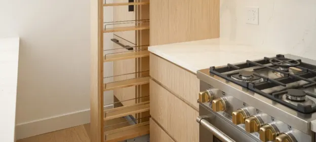 Custom white oak kitchen cabinetry with a natural light wood finish