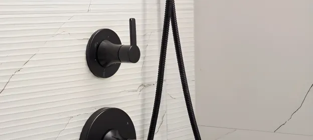 Matte black faucet and hardware finishes in the renovated co-op
