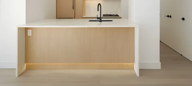 Radiant heated flooring installed in the Gramercy kitchen and bathroom