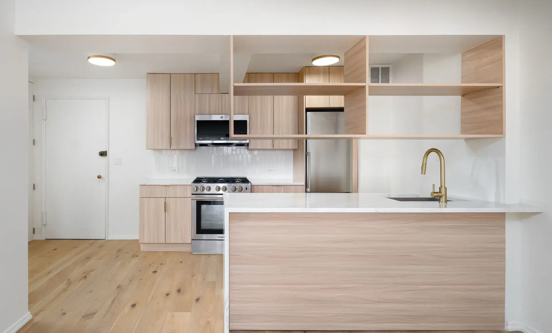 Greenwich Village apartment after renovation with open kitchen design