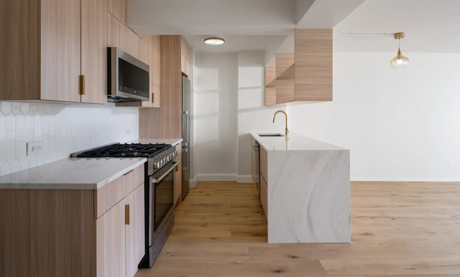Greenwich Village apartment after renovation with hanging shelves and plants