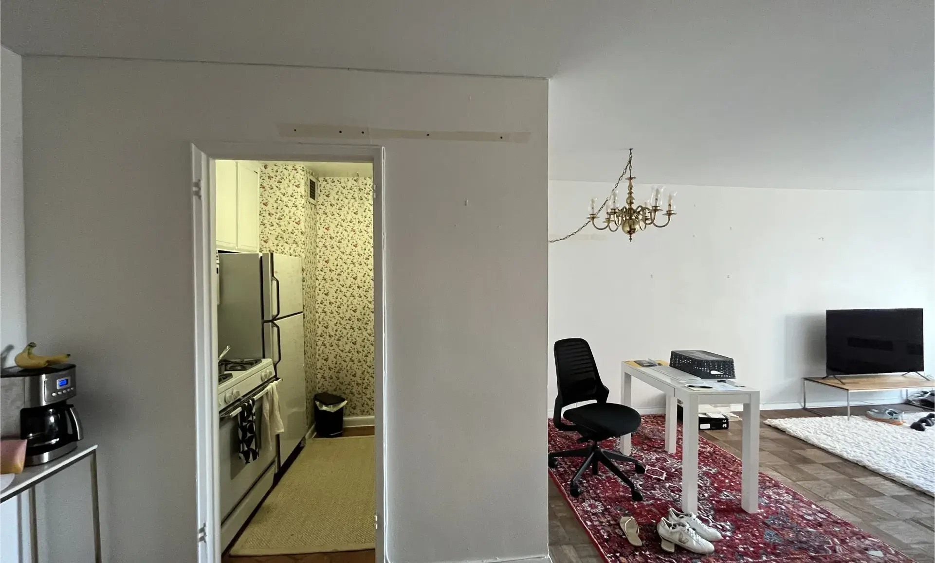 Greenwich Village apartment before renovation showing lack of storage