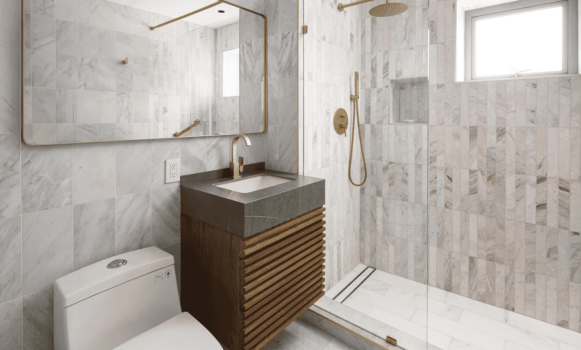 Guest bathroom featuring white marble wall tile, fluted dark-wood vanity with brass faucet, and walk-in shower with Arabescato marble accent, 352 W 110th St Manhattan Valley NYC