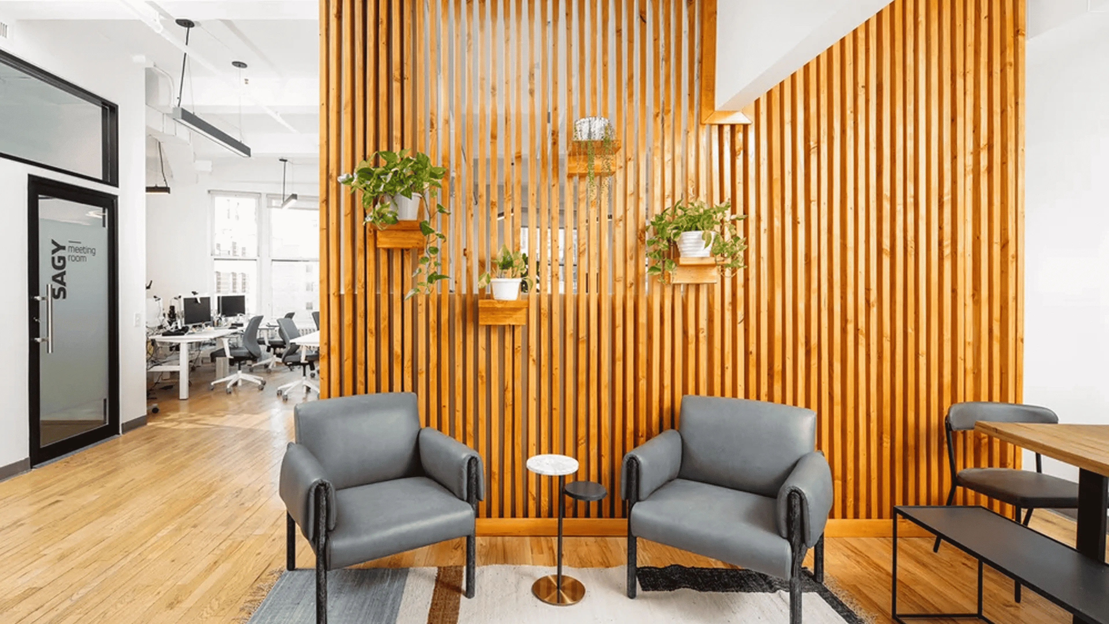 Modern office space with open workspaces, collaborative areas, and private offices for a fast-growing tech company.