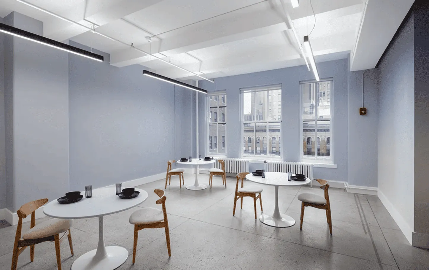 Mechanical electrical and fire protection systems in NYC tech headquarters with clean exposed ceiling