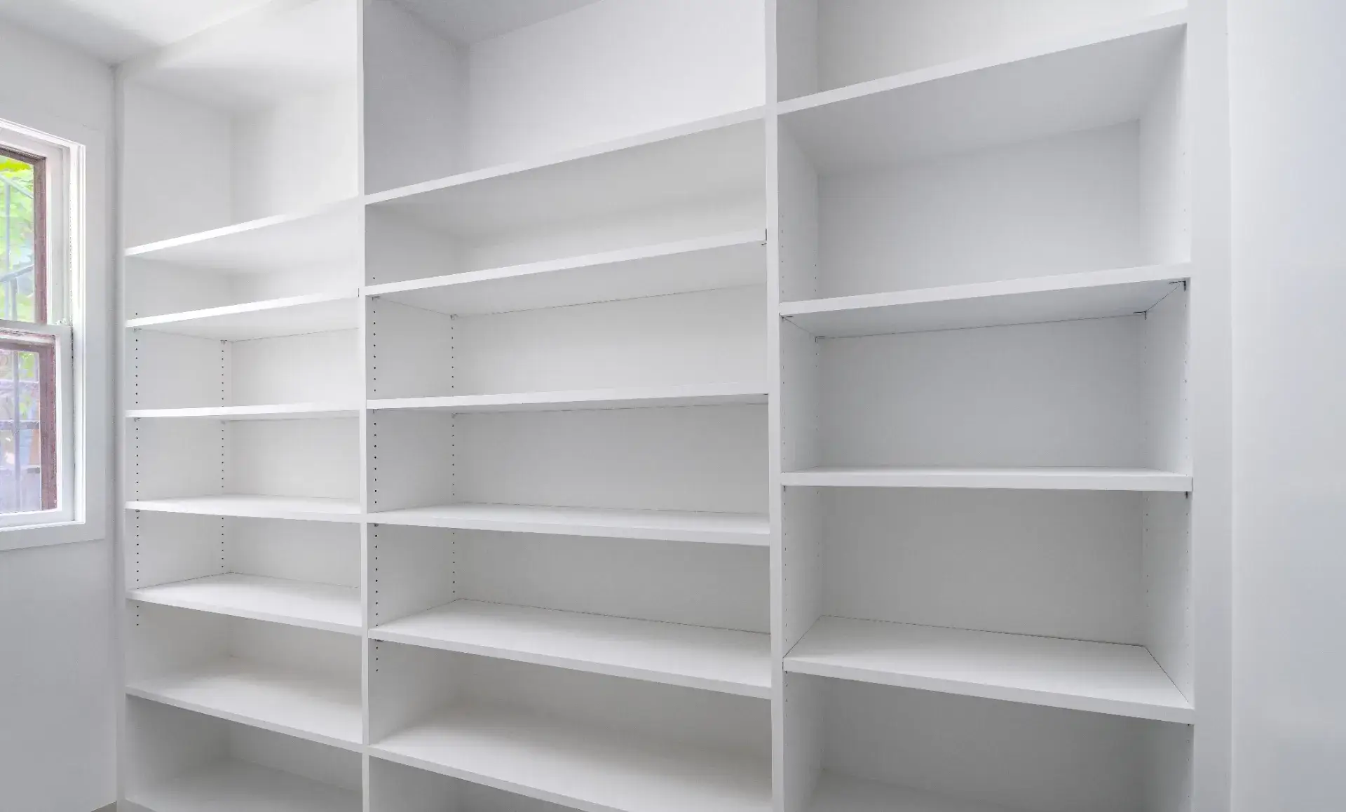 Brooklyn home renovation after photo showing modernized bathroom with geometric tiles