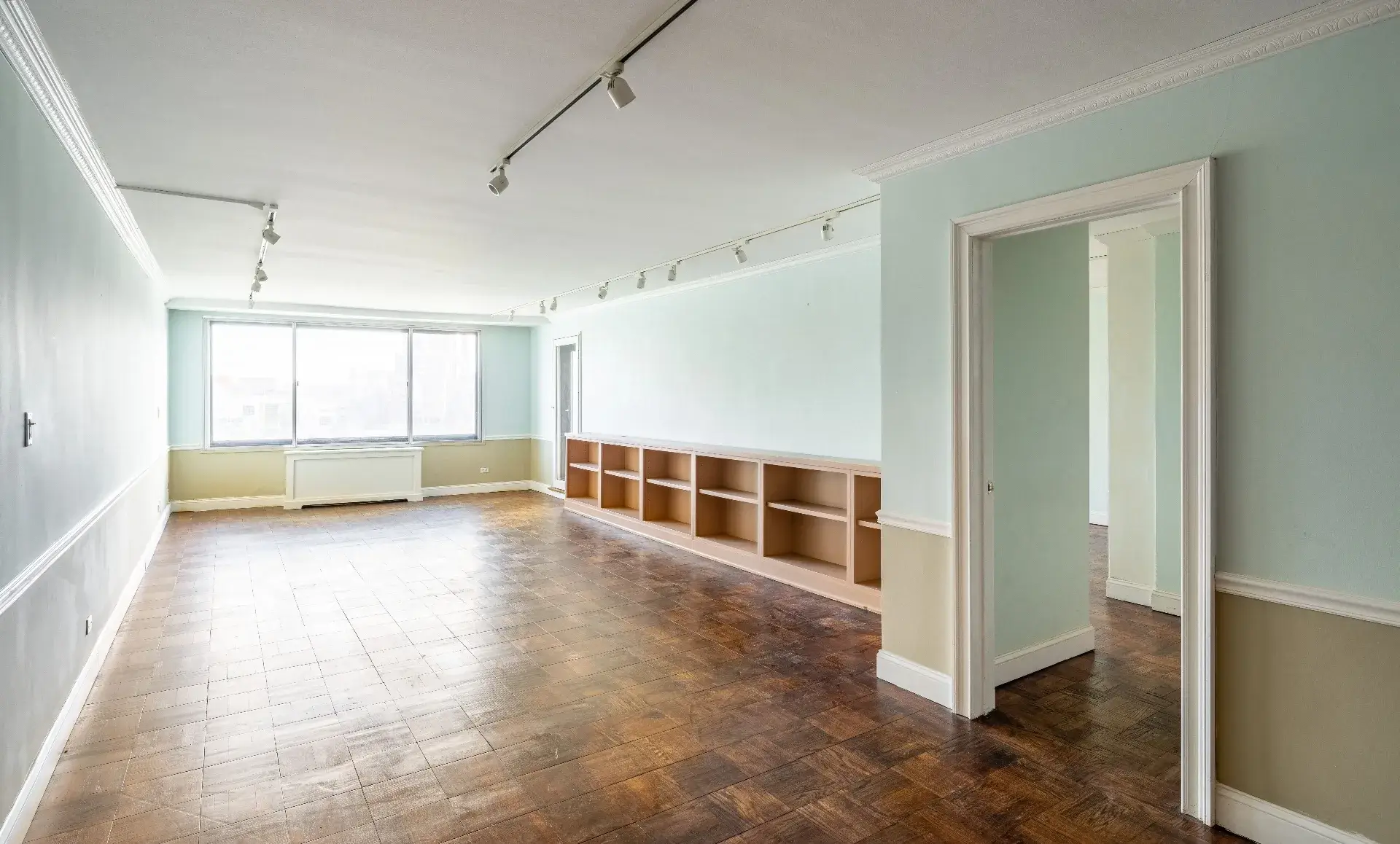 UES apartment renovation before photo showing outdated living room