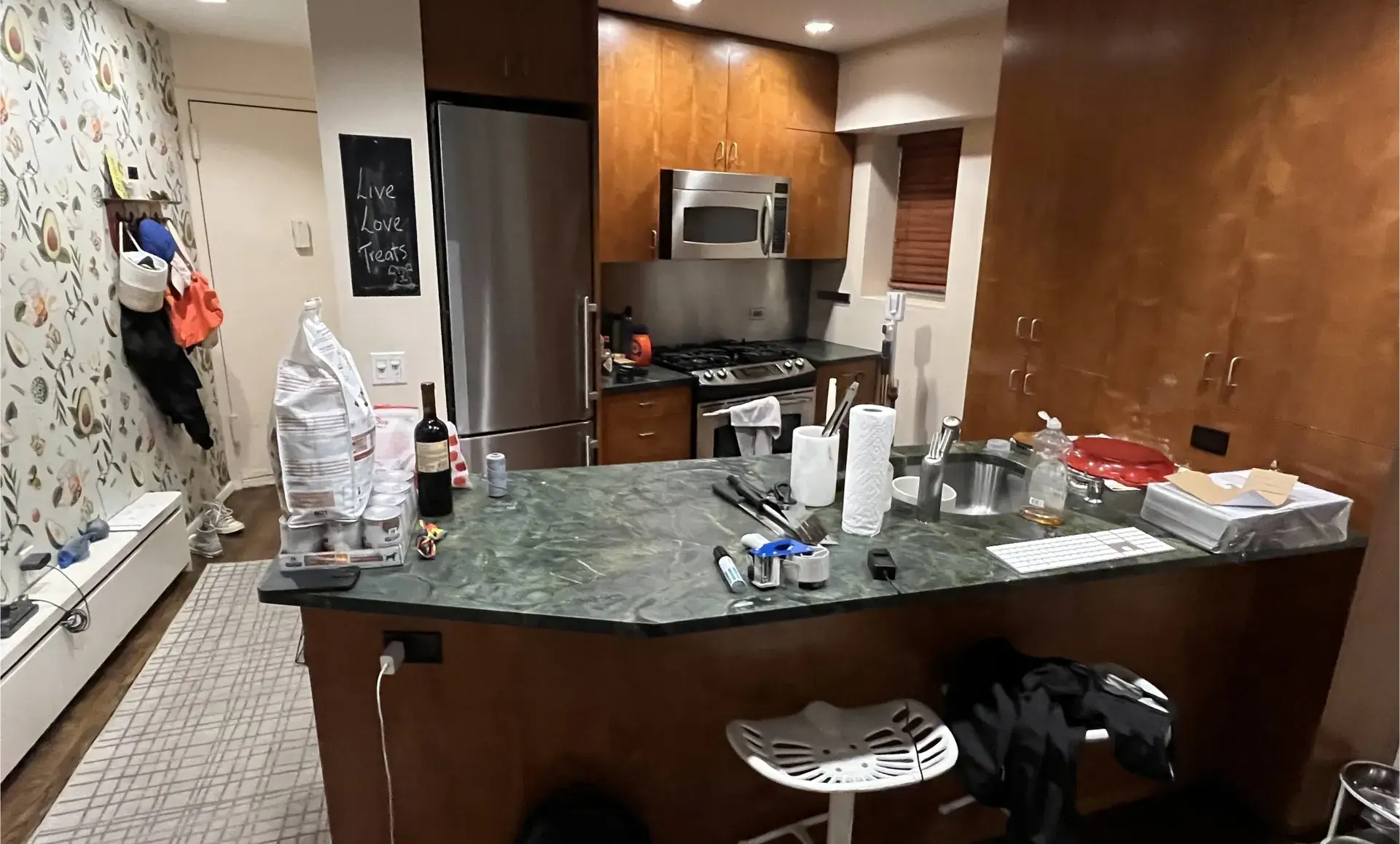 Triplex apartment renovation before photo showing open loft space