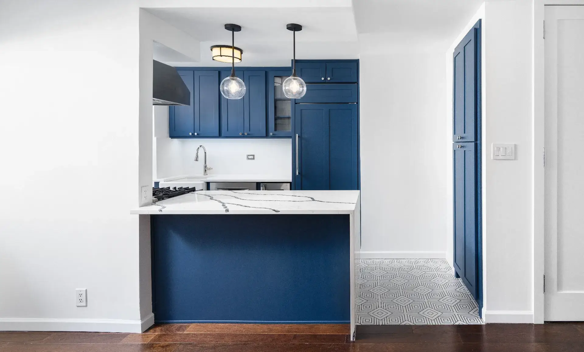 Upper East Side kitchen after renovation with farmhouse sink