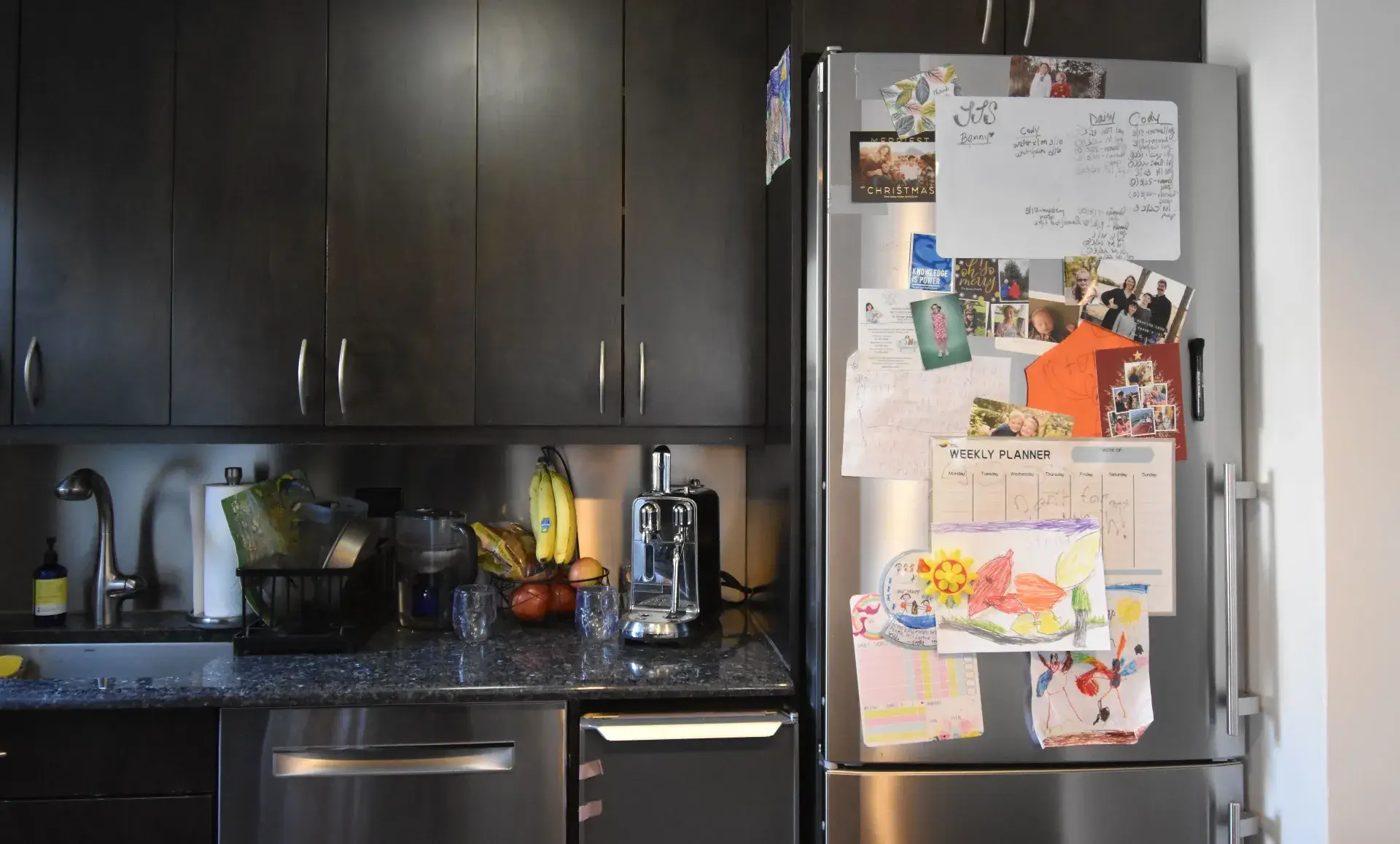 Upper East Side kitchen before renovation showing old flooring